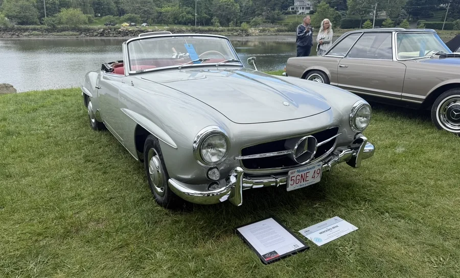 Silver classic Mercedes-Benz roadster on display at a car show